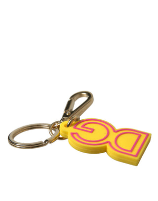 Gelber Gummi goldfarbenes Metall DG Logo Schlüsselanhänger