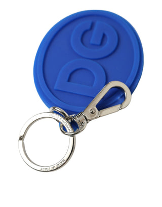 Llavero de goma azul con logo DG y metal de latón plateado