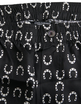 Pantalones negros de seda con estampado de herradura