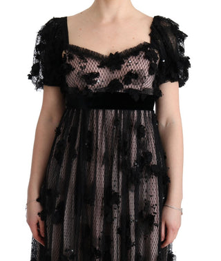 Schwarz-rosa Seidenkleid mit Applikationen