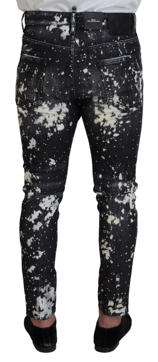 Grau verwaschene Jeans mit weißen Farbspritzern in Skinny-Passform