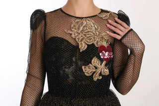 Vestido línea A negro con corazón de cristal dorado