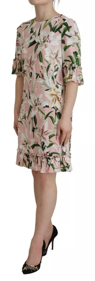 Vestido rosa de viscosa con forma ajustada y largo hasta la rodilla