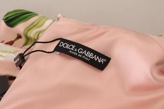 Vestido rosa de viscosa con forma ajustada y largo hasta la rodilla