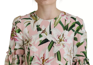 Vestido rosa de viscosa con forma ajustada y largo hasta la rodilla