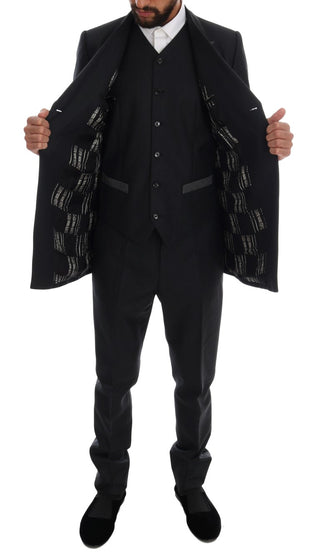 Traje de tres piezas de lana gris de doble botonadura