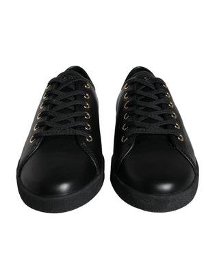 Zapatillas clásicas de cuero negro y dorado