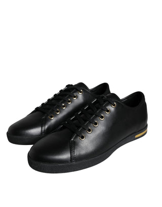 Zapatillas clásicas de cuero negro y dorado