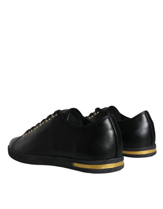 Zapatillas clásicas de cuero negro y dorado