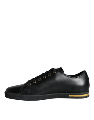 Zapatillas clásicas de cuero negro y dorado