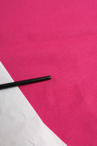 Camiseta rosa de algodón con cuello redondo y mangas cortas tipo tee