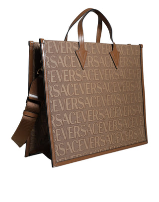 Bolso tote cruzado de jacquard y cuero marrón con logo y asa superior
