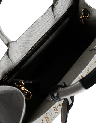 Bolso tote cruzado de lona y cuero blanco con logo y asa superior
