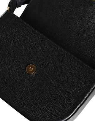 Bolso cruzado negro de cuero de becerro granuloso con logo y bandolera