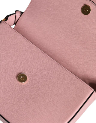 Bolso cruzado rosa de cuero de becerro granuloso con logo y bandolera