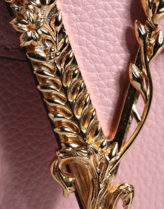 Bolso cruzado rosa de cuero de becerro granuloso con logo y bandolera