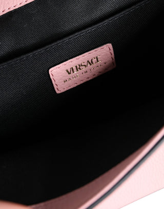 Bolso cruzado rosa de cuero de becerro granuloso con logo y bandolera