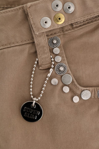 Jeans slim fit de algodón elástico beige