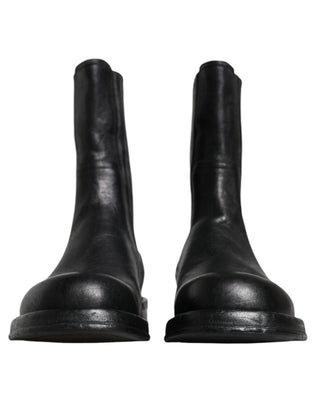 Schwarze kniehohe Lederstiefel