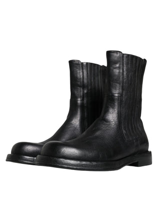 Schwarze kniehohe Lederstiefel