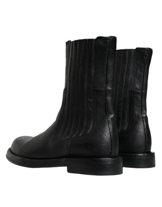 Schwarze kniehohe Lederstiefel