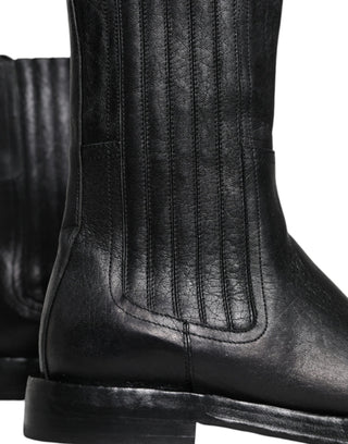 Schwarze kniehohe Lederstiefel