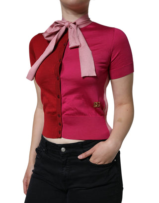 Top rosa con cuello ascot y mangas cortas tipo pulóver