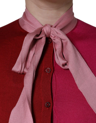 Top rosa con cuello ascot y mangas cortas tipo pulóver