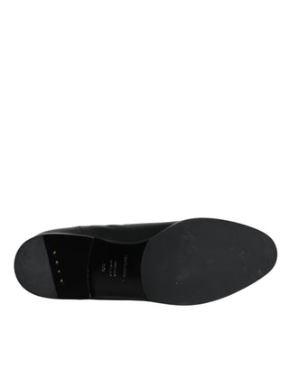 Schwarze Leder-Stiefel mit Logo bis zur Mitte der Wade