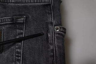 Dunkelgraue, zerrissene Röhrenjeans aus Baumwolle