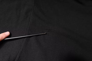 Schwarzer Kapuzenpullover im Camouflage-Muster