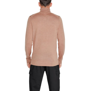 Beiger Rollkragenpullover aus Wolle