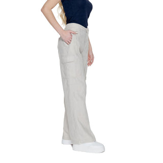 Pantalones acampanados de lino beige  