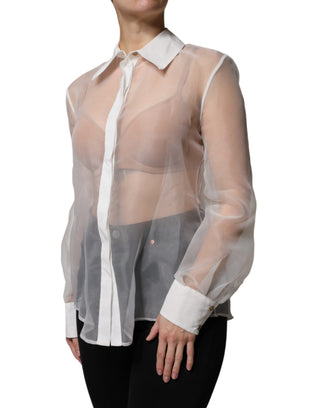 Blusa blanca transparente con cuello, botones y mangas largas