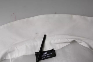 Blusa blanca transparente con cuello, botones y mangas largas