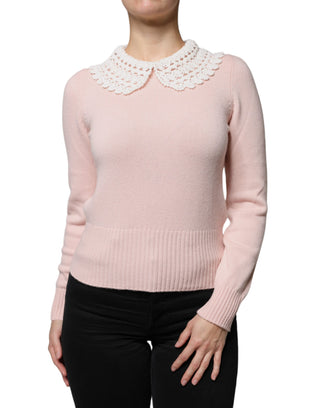 Blusa rosa de cachemira con cuello y mangas largas tejidas