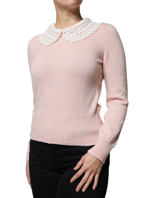 Blusa rosa de cachemira con cuello y mangas largas tejidas