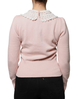 Blusa rosa de cachemira con cuello y mangas largas tejidas