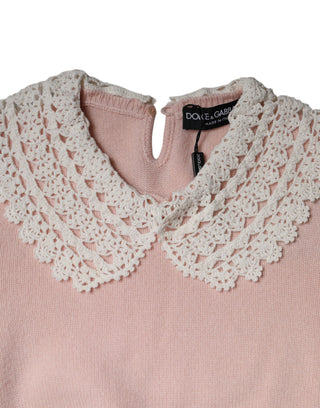 Blusa rosa de cachemira con cuello y mangas largas tejidas