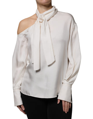 Blusa beige de seda con cuello ascot y mangas largas