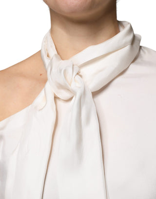 Blusa beige de seda con cuello ascot y mangas largas