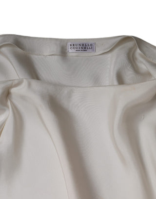 Blusa beige de seda con cuello ascot y mangas largas