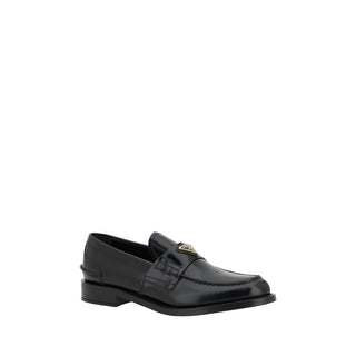 Mocasines de cuero negro con logo