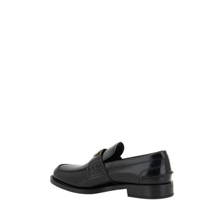 Mocasines de cuero negro con logo