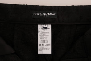 Schwarze florale Brokat-Caprihose