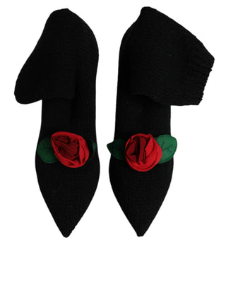 Botas negras de tacón stiletto hasta media pantorrilla