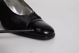 Zapatos negros de cuero con tacones de bloque