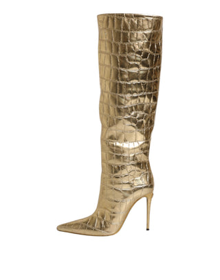Botas altas doradas de cuero con tacones de aguja