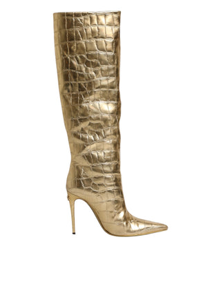 Botas altas doradas de cuero con tacones de aguja