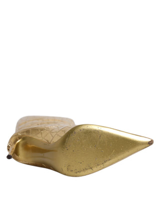 Botas altas doradas de cuero con tacones de aguja